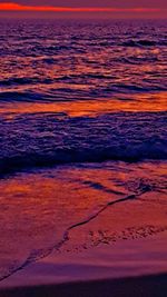 Scenic view of sea against sky at sunset