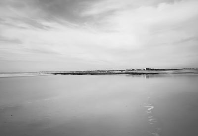 Reflection of clouds in sea