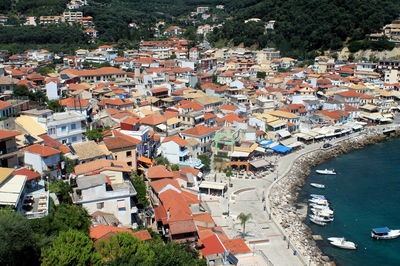 High angle view of townscape by lake