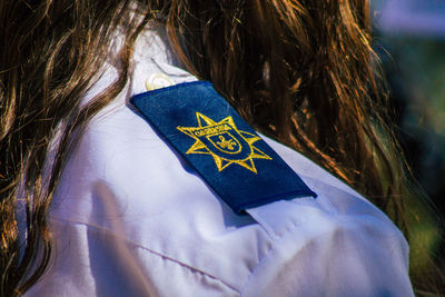 Close-up of woman with text in hair