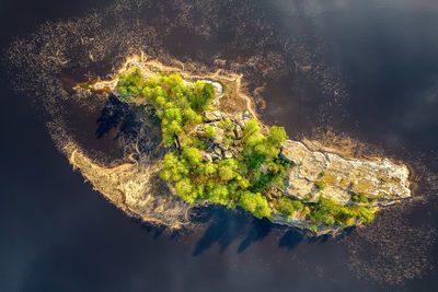 High angle view of rocks island in lake