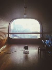 Empty chairs and tables in room