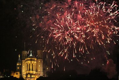 Firework display at night