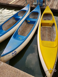 High angle view of boats moored at lake