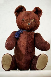 Close-up of stuffed toy against white background