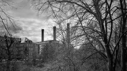 Low angle view of abandoned building against sky