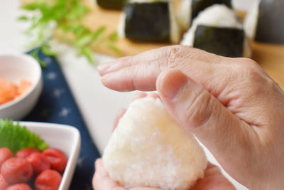 Close-up of person preparing food