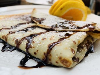 High angle view of a crêpe in plate on table