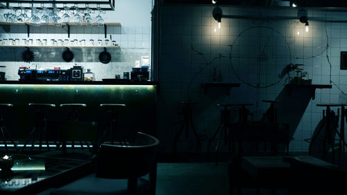 Close-up of chairs on table