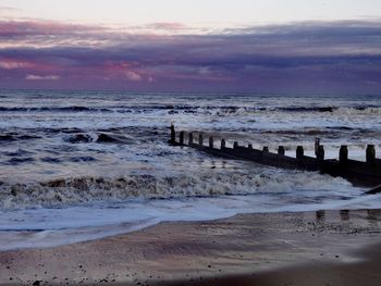 Scenic view of beach during sunset