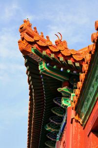 Low angle view of statue against sky