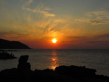 Scenic view of sea during sunset