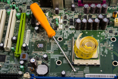 Close-up of objects on circuit board