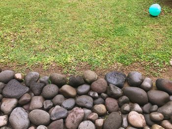 High angle view of ball on stones