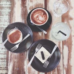 High angle view of coffee cup on table