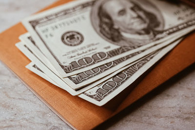 Close-up of banknotes on table