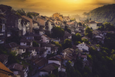 High angle view of townscape, veliko tarnovo, against sky during sunset