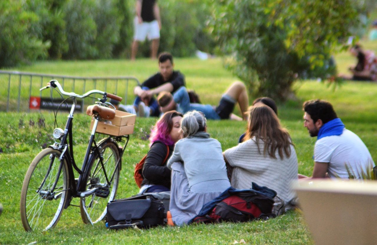 group of people, grass, men, real people, plant, togetherness, women, sitting, bicycle, child, lifestyles, nature, leisure activity, medium group of people, group, people, adult, casual clothing, males, day, outdoors, daughter