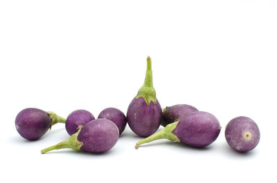 Close-up of fruits against white background