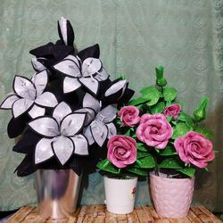 Close-up of pink rose flower in vase