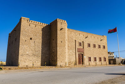 Oman, dhofar, mirbat, facade of old fort