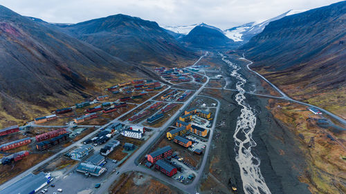 High angle view of cars on road against sky