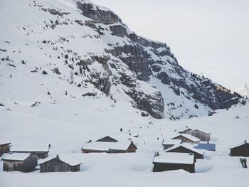 Scenic view of mountains against sky during winter