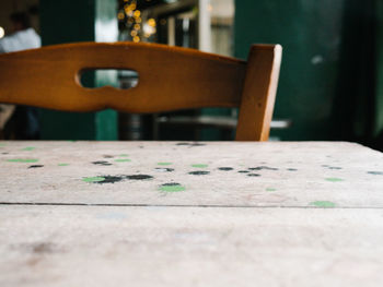 Close-up of empty chairs and table in restaurant