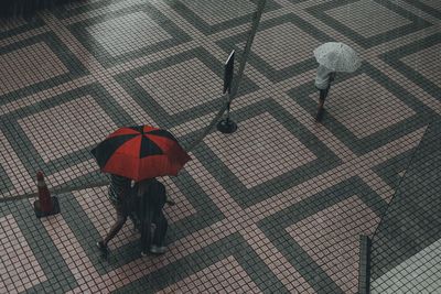 High angle view of people walking on street