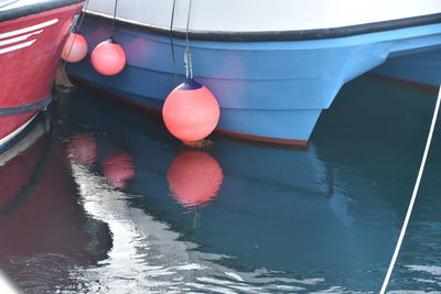 High angle view of boats moored in water