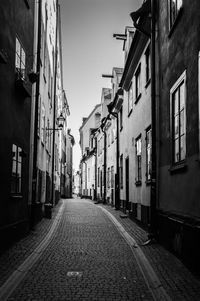 Narrow alley along buildings