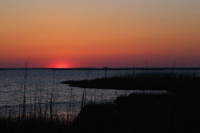 Scenic view of sunset over sea