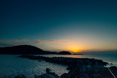 Scenic view of sea against sky during sunset