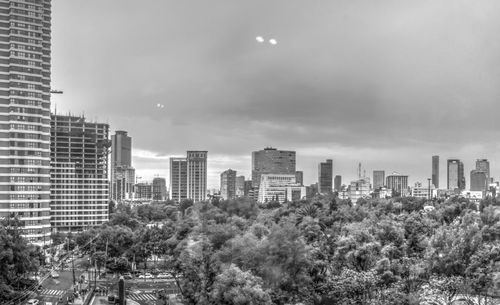 Modern cityscape against sky