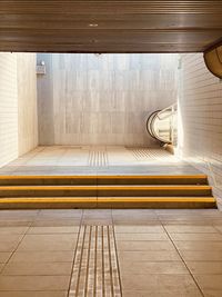 Low angle view of railroad tracks in tunnel