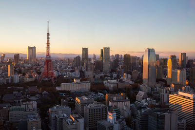 Cityscape against sky during sunset