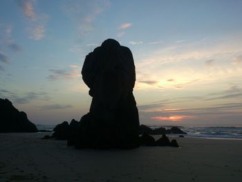 Scenic view of sea at sunset