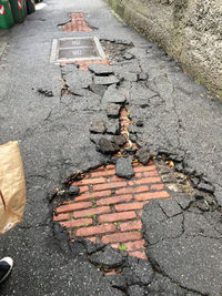 High angle view of manhole on street