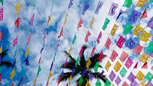 High angle view of multi colored umbrellas hanging on clothesline