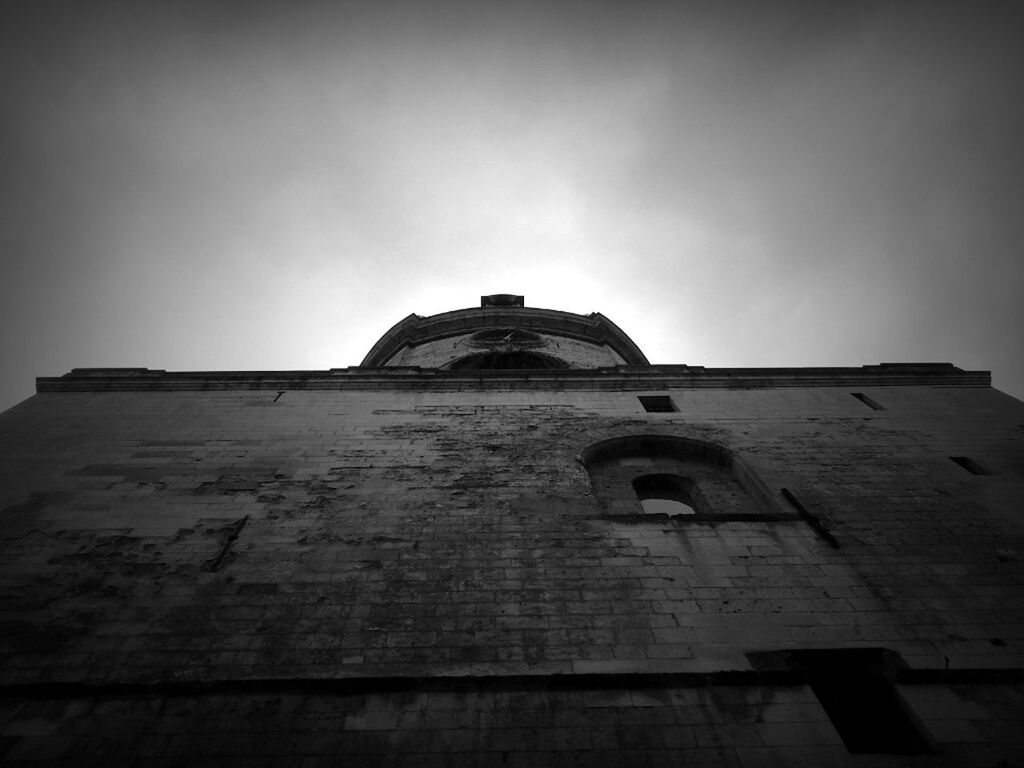 architecture, built structure, building exterior, low angle view, history, clear sky, sky, old, copy space, religion, place of worship, the past, day, tower, outdoors, spirituality, no people, wall - building feature, church