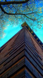 Low angle view of building against blue sky