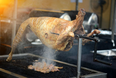 Close-up of meat on barbecue grill