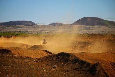 Person riding quad bike