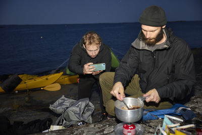 View of tourists camping at sea