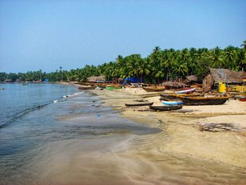 Scenic view of beach against clear sky