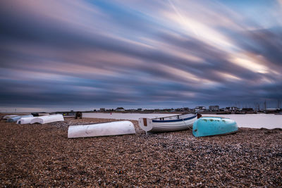 Scenic view of beach against sky during sunset