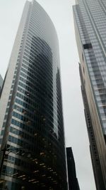 Low angle view of modern buildings against sky