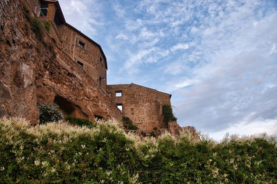 Low angle view of old building against sky