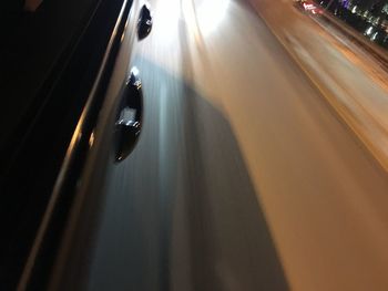 Blurred motion of car on highway at night
