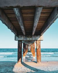 View of pier over sea against sky